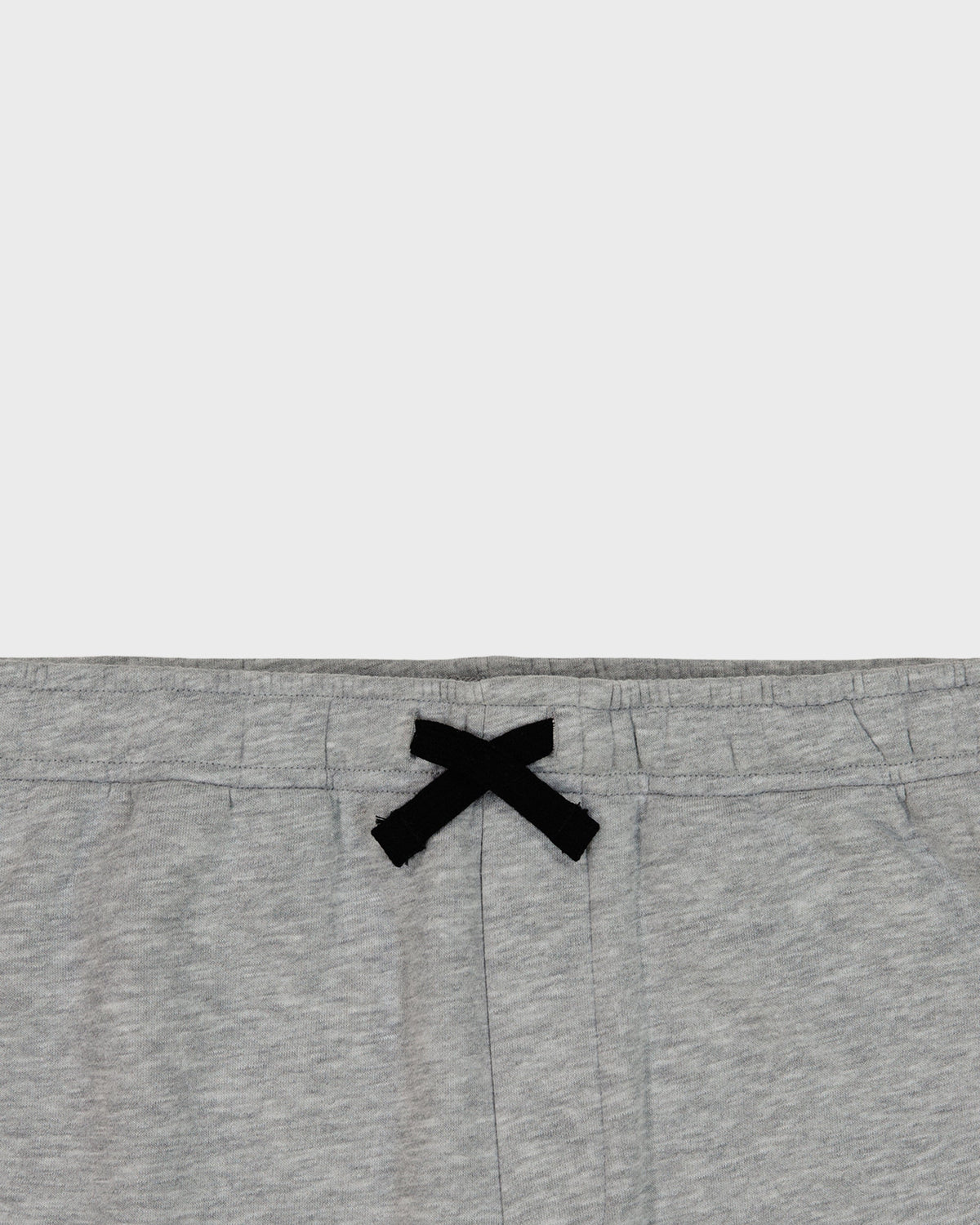 Gray sweatpants with a black logo on a white background